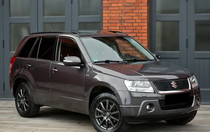 samochody osobowe Suzuki Grand Vitara cena 32900 przebieg: 163600, rok produkcji 2009 z Ostroróg